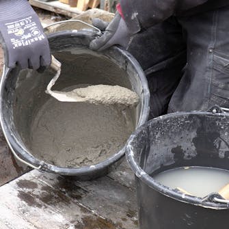 Udskiftning af mursten: Bland din mørtel Udskiftning af mursten: Bland din mørtel